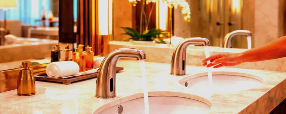 Touchless bathroom faucet sensor activation commercial restroom infrastructure engineering system stainless fixture